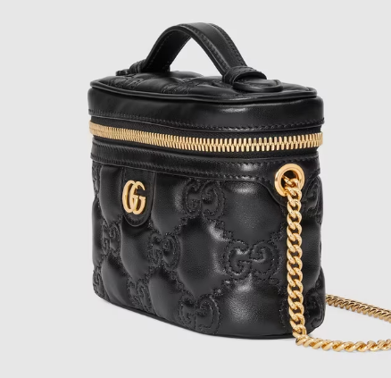 GG Matelassé top handle mini bag